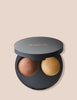 This compact duo contains the highlighter and contour to create the sculpted effect with the bronzed powder and champagne highlight.